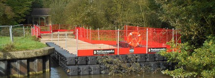 This impressive pontoon is needed to repair the river wall